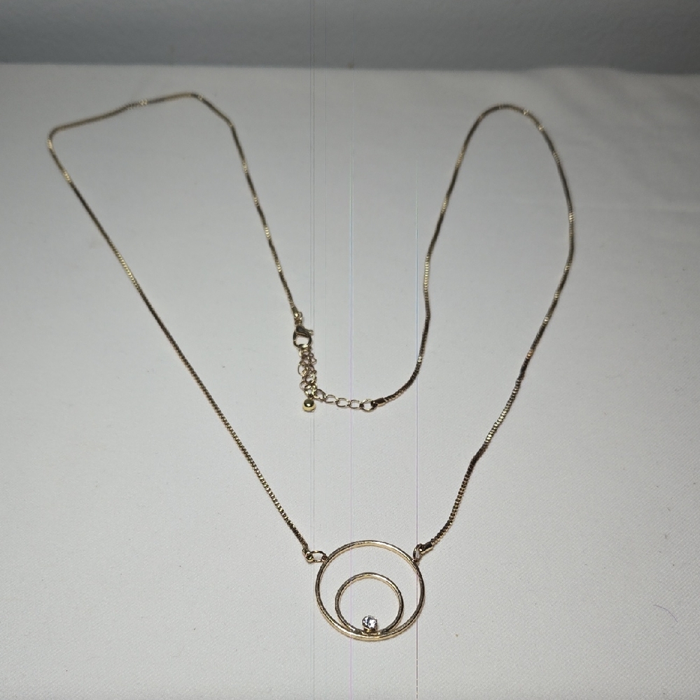 Elegant Gold Necklace with Spiral Pendant